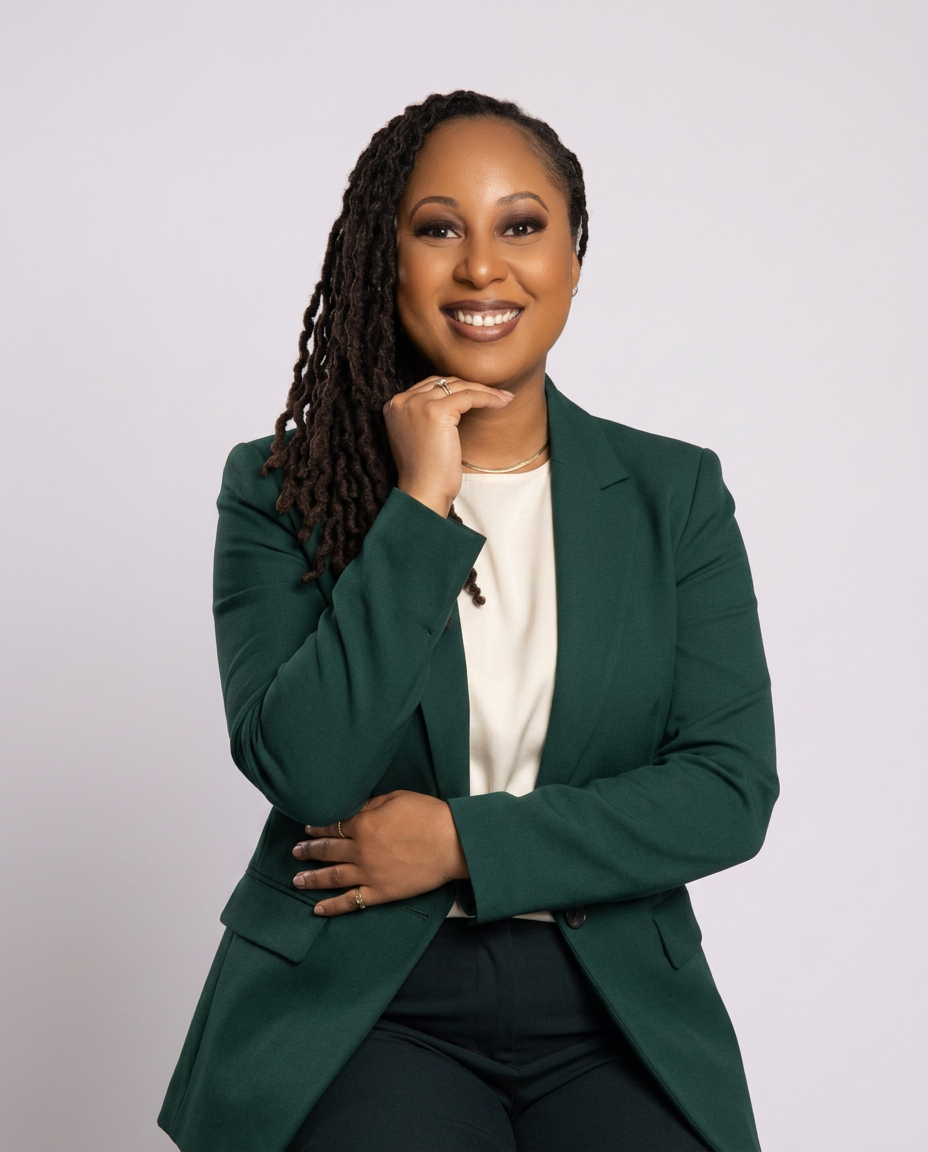 Audriana Vassel, Founder and Owner of Harmony House, in a green blazer